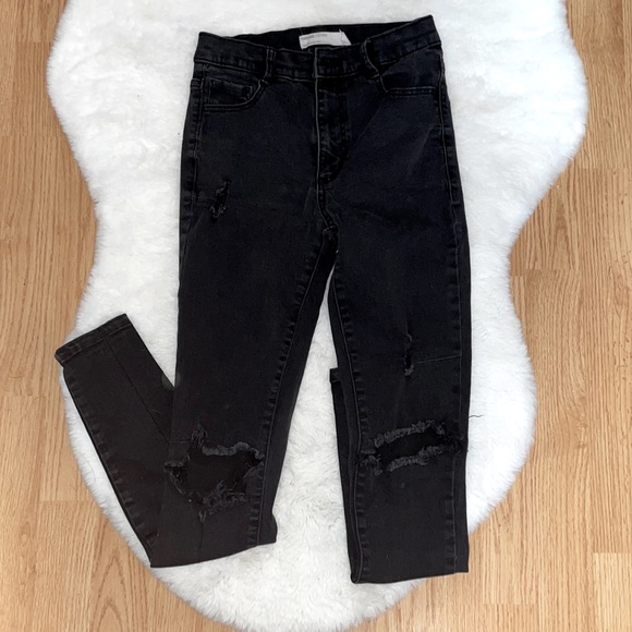 Garage distressed black skinny jeans
